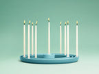Emerald Stoneware Ripple Menorah with candles by Tchotchke