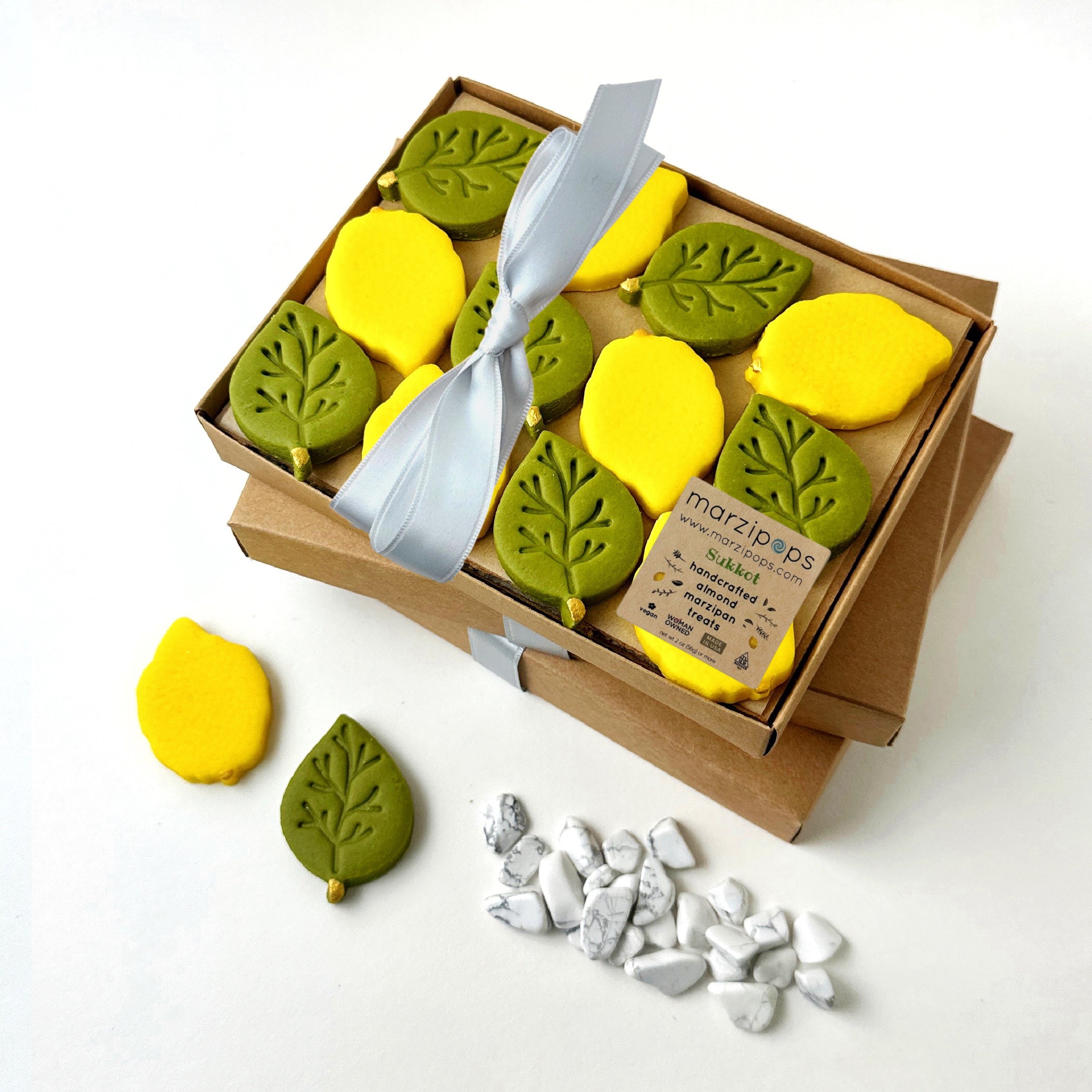 Sukkot marzipan etrogim and green leaves packaged in a Marzipops gift box