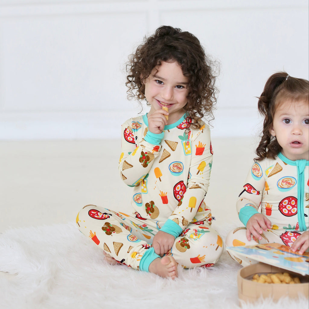 Children wearing matching Taste of Israel bamboo pajamas by Shiloh & Kate