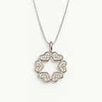 Silver Star of David necklace formed from six textured hearts