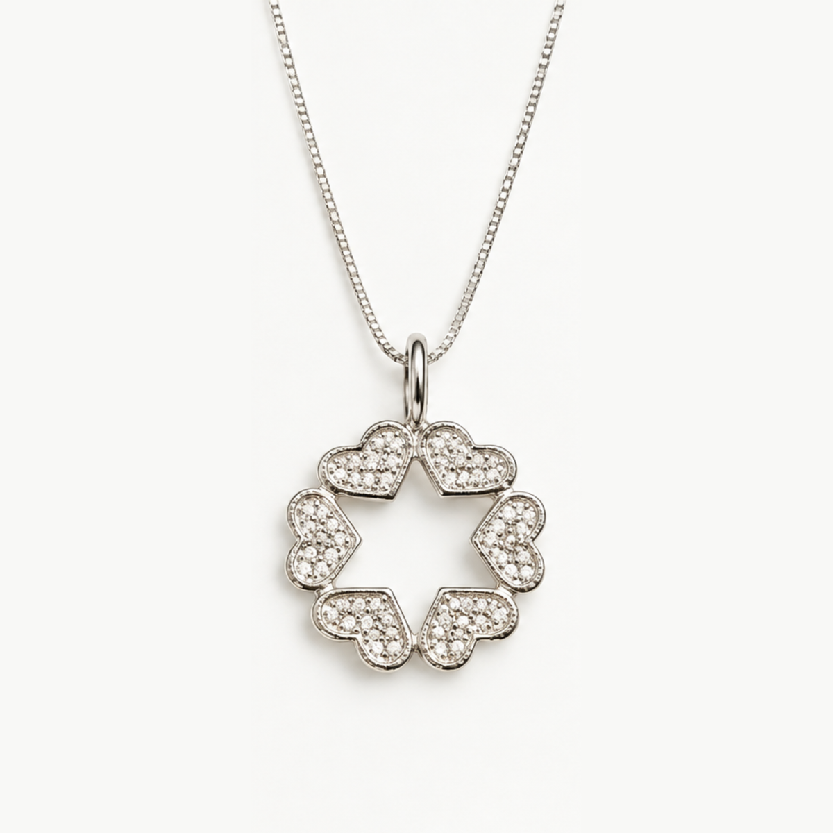 Silver Star of David necklace formed from six textured hearts