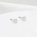 Silver Tiny Star of David stud earrings by Shlomit Ofir