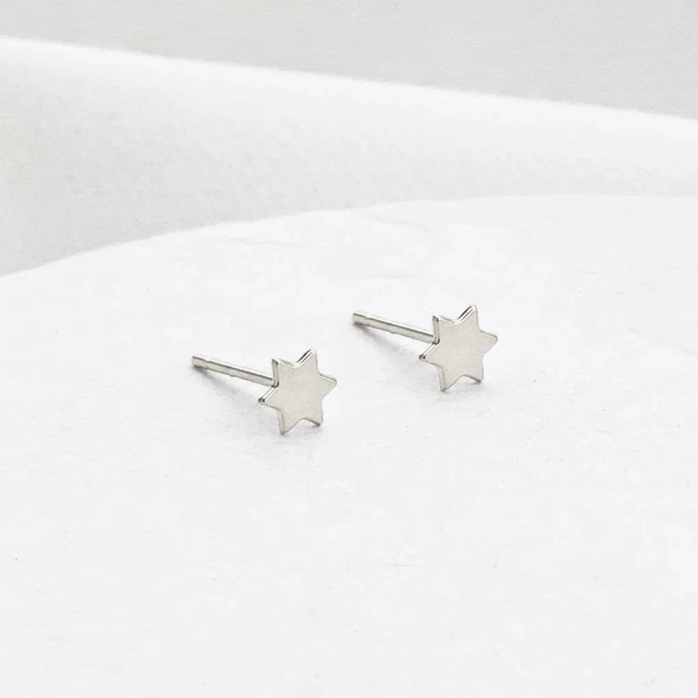 Silver Tiny Star of David stud earrings by Shlomit Ofir