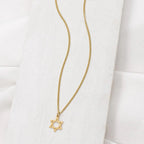 Gold Tiny Star of David Necklace by Shlomit Ofir