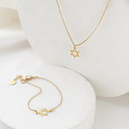 Tiny Star of David Necklace styled with matching bracelet