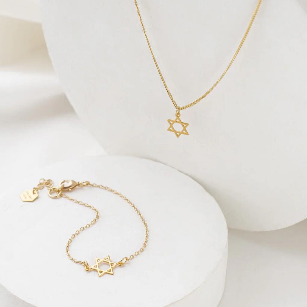 Tiny Star of David Necklace styled with matching bracelet