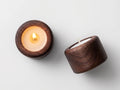 Walnut wood Shabbat tealight candleholders with lit tealight by Oneg