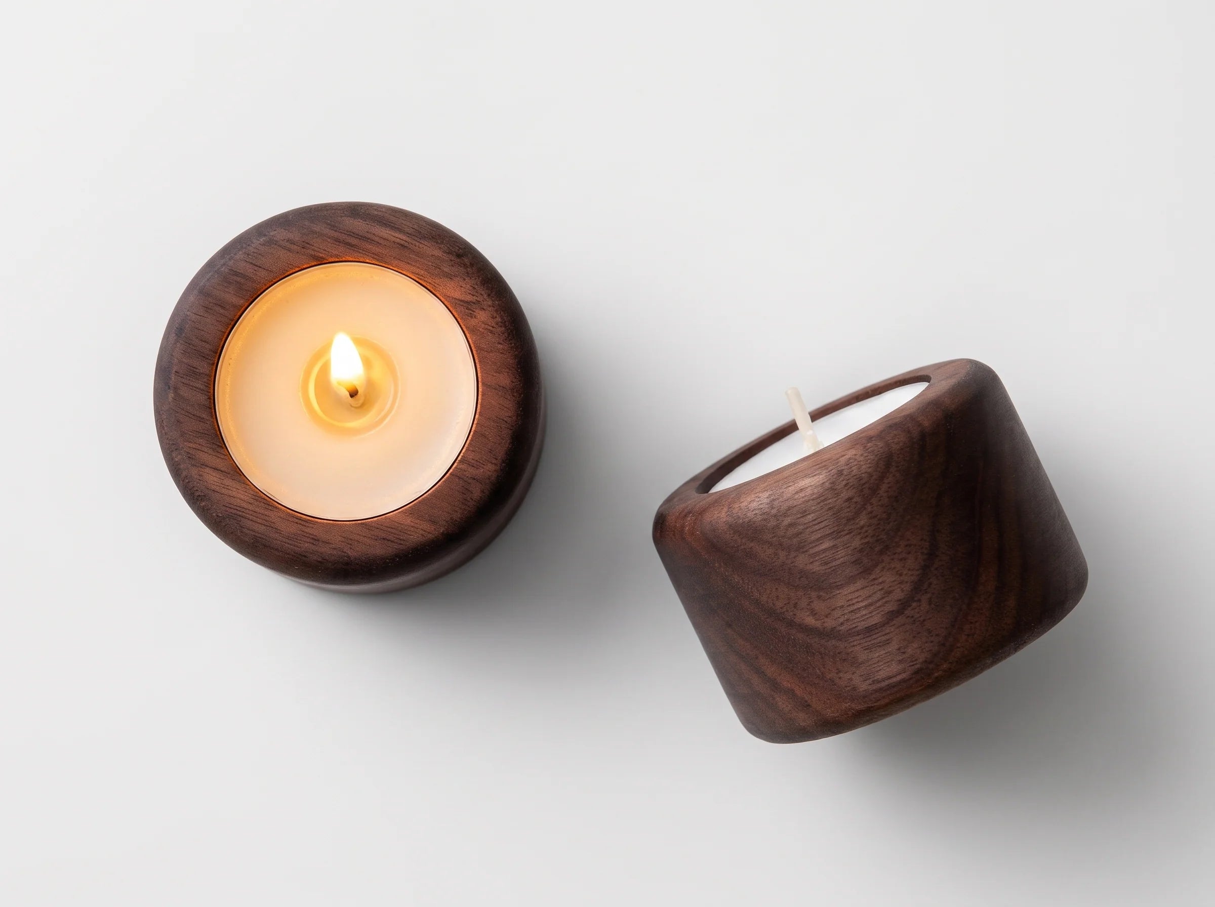 Walnut wood Shabbat tealight candleholders with lit tealight by Oneg