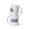 White ceramic ZIONisM Home mug featuring the Zionism Is Home graphic, front view