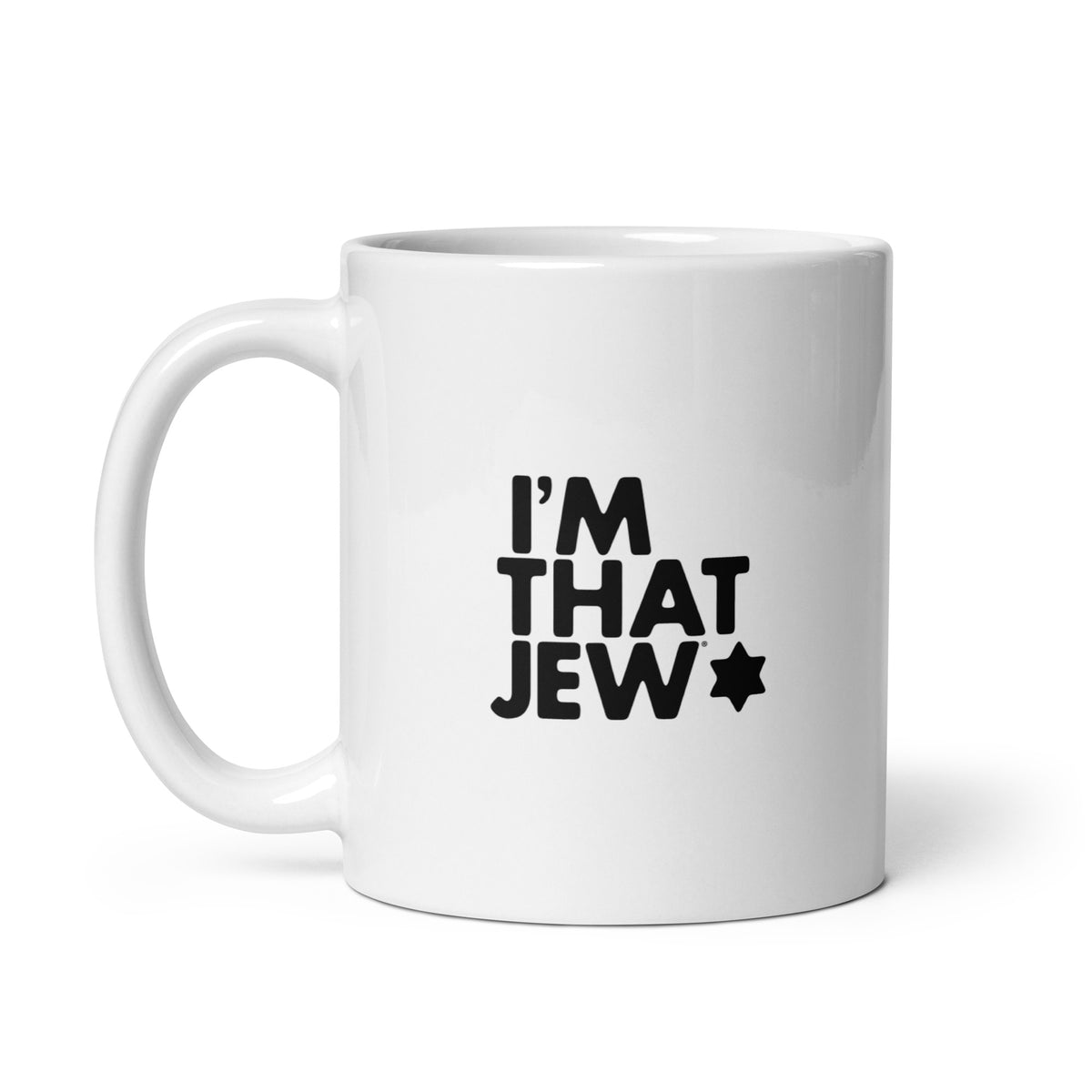 White ceramic I'm That Jew® mug with black logo, handle on left
