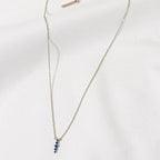 Silver Zen Necklace with five blue zircon stones by Shlomit Ofir