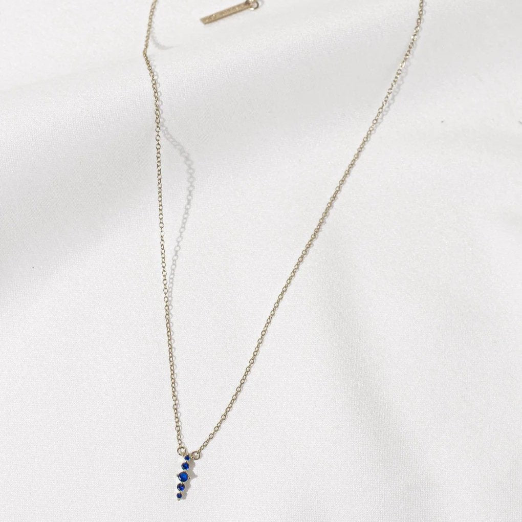 Silver Zen Necklace with five blue zircon stones by Shlomit Ofir